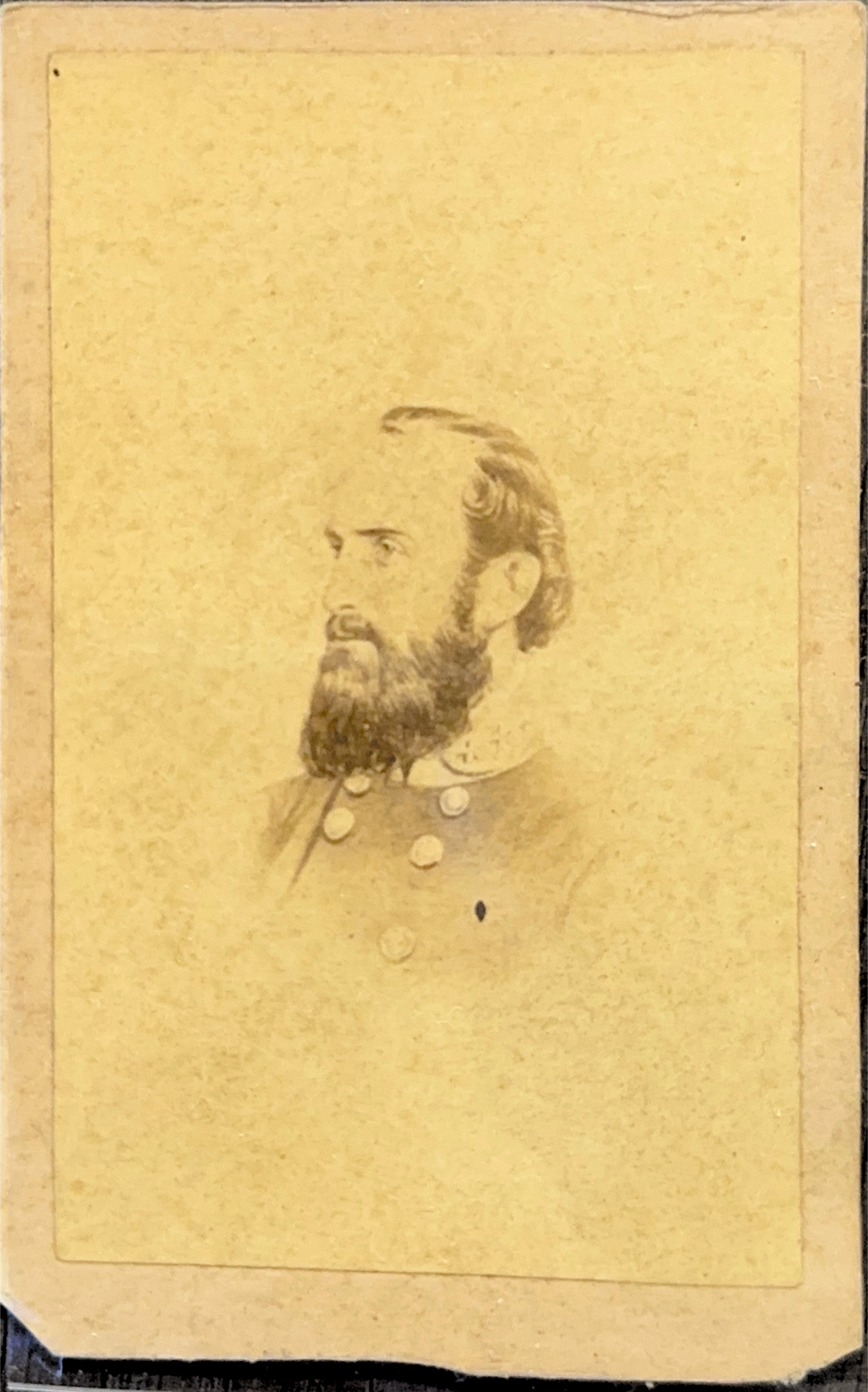Portrait of the bust of Thomas 'Stonewall' Jackson in military uniform facing left of the viewer.